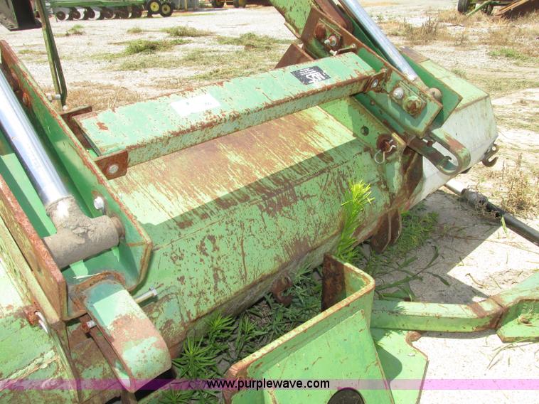 image for item F7445 John Deere 158 tractor loader