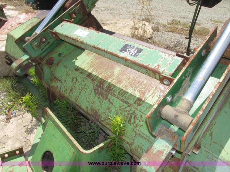 image for item F7445 John Deere 158 tractor loader