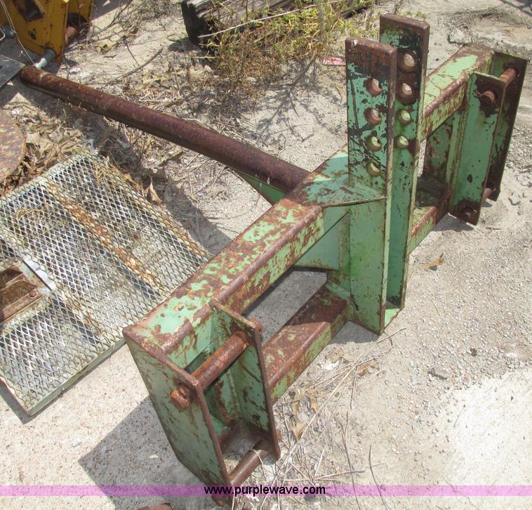 image for item F7445 John Deere 158 tractor loader