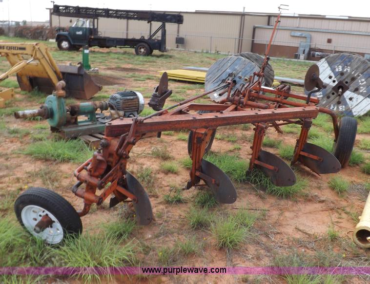 image for item H1775 Case four bottom one way plow