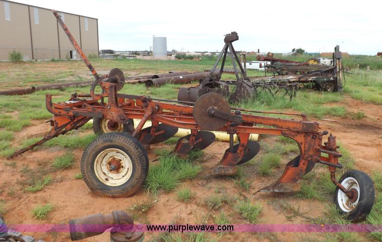image for item H1775 Case four bottom one way plow