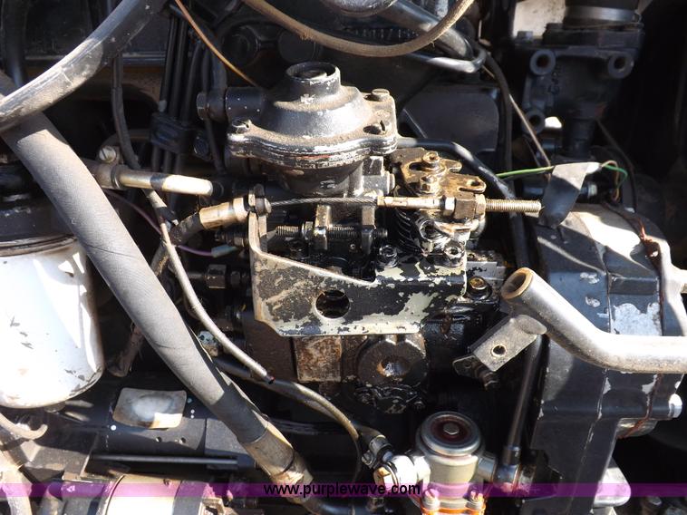 image for item H1794 2006 New Holland TN70A MFWD tractor