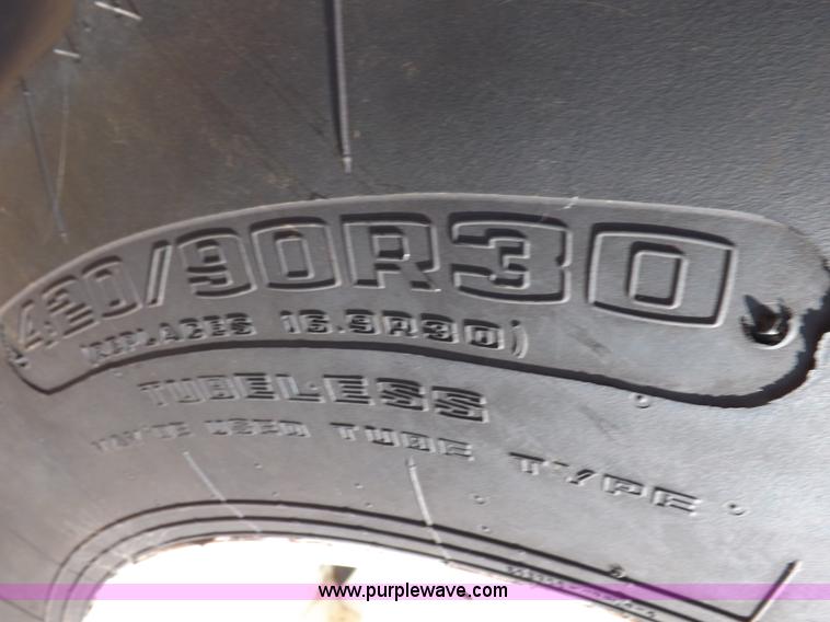 image for item H1794 2006 New Holland TN70A MFWD tractor