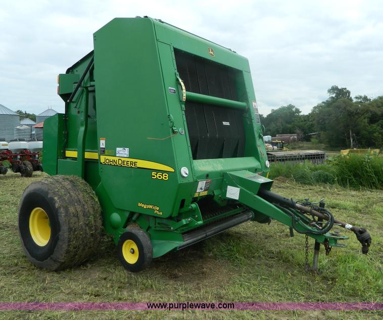 image for item H2449 2008 John Deere 568 mega wide round baler