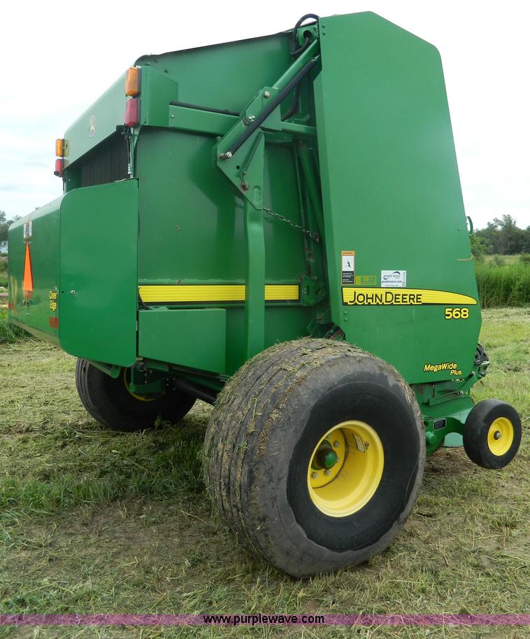 image for item H2449 2008 John Deere 568 mega wide round baler