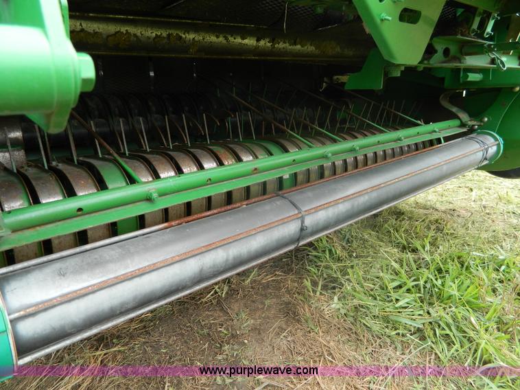 image for item H2449 2008 John Deere 568 mega wide round baler