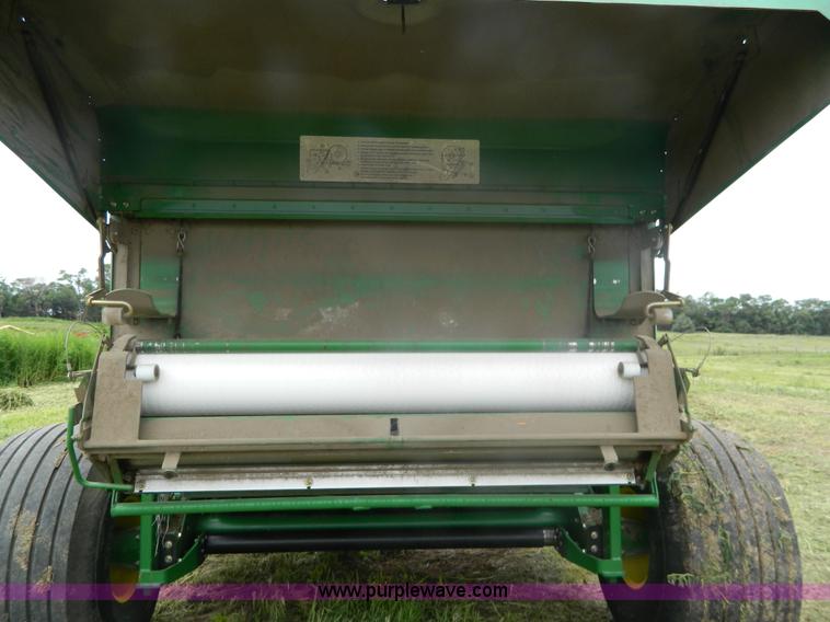 image for item H2449 2008 John Deere 568 mega wide round baler