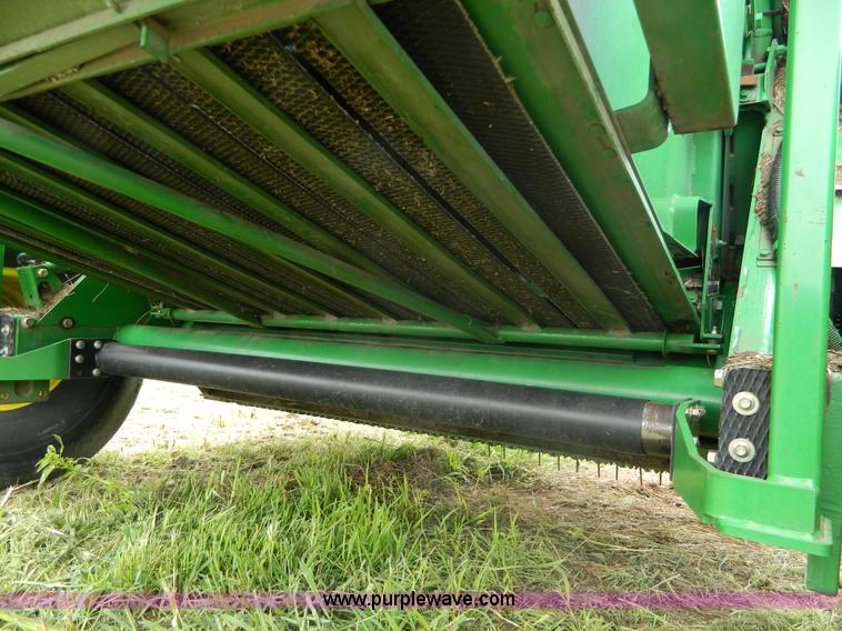 image for item H2449 2008 John Deere 568 mega wide round baler