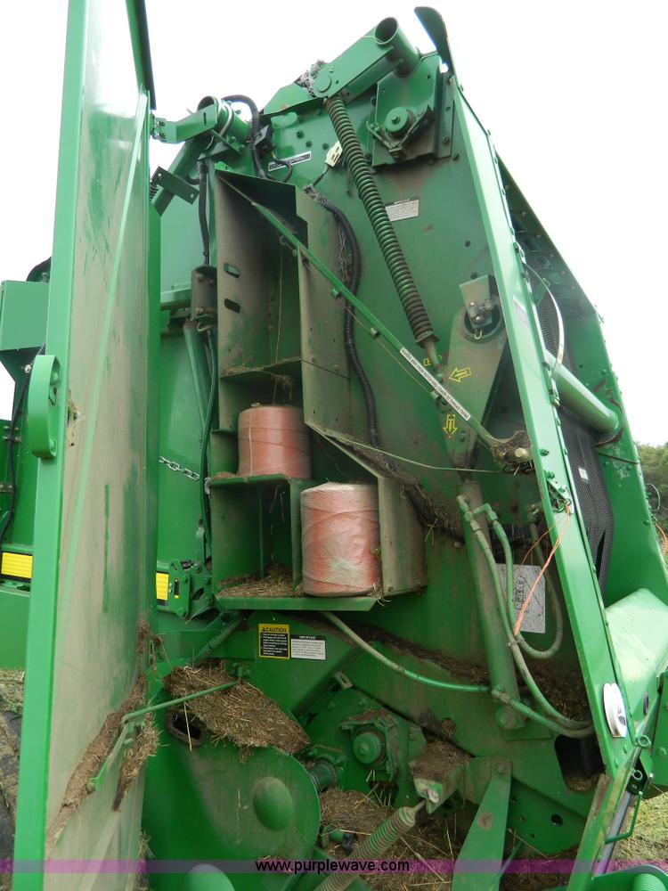 image for item H2449 2008 John Deere 568 mega wide round baler