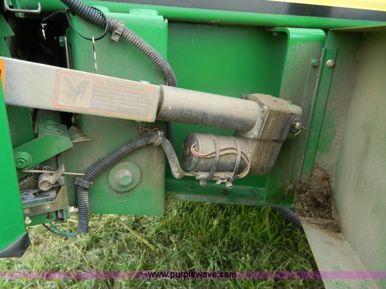 image for item H2449 2008 John Deere 568 mega wide round baler