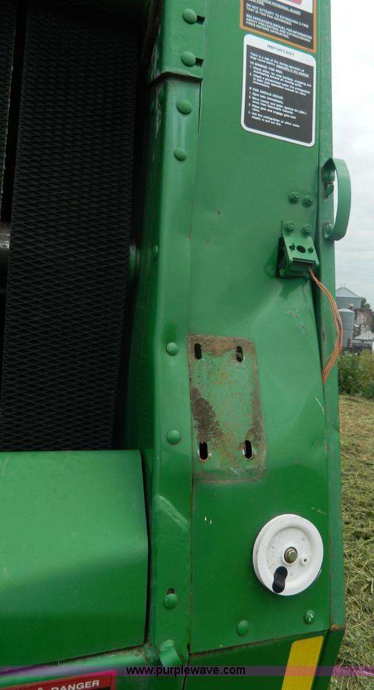 image for item H2449 2008 John Deere 568 mega wide round baler