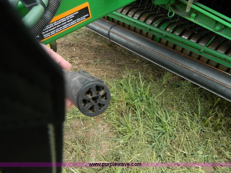 image for item H2449 2008 John Deere 568 mega wide round baler