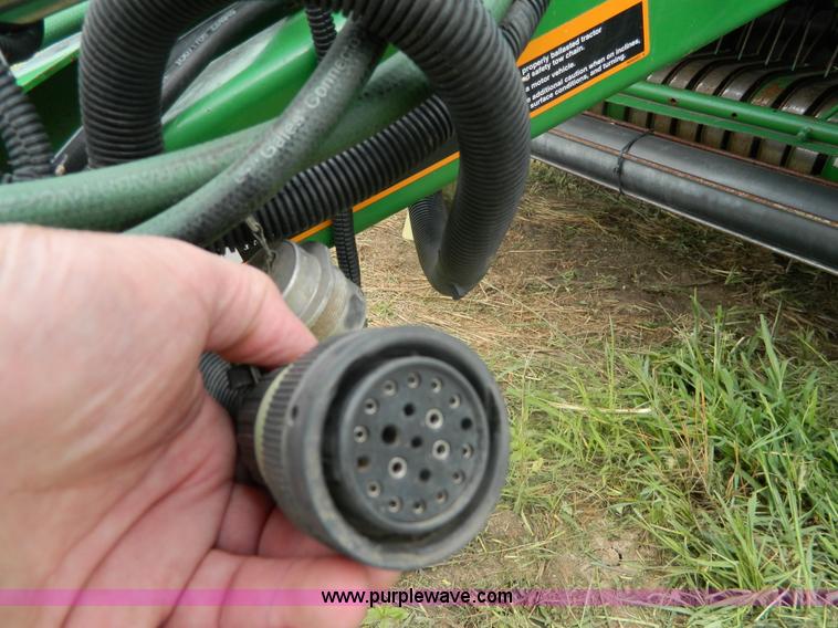 image for item H2449 2008 John Deere 568 mega wide round baler
