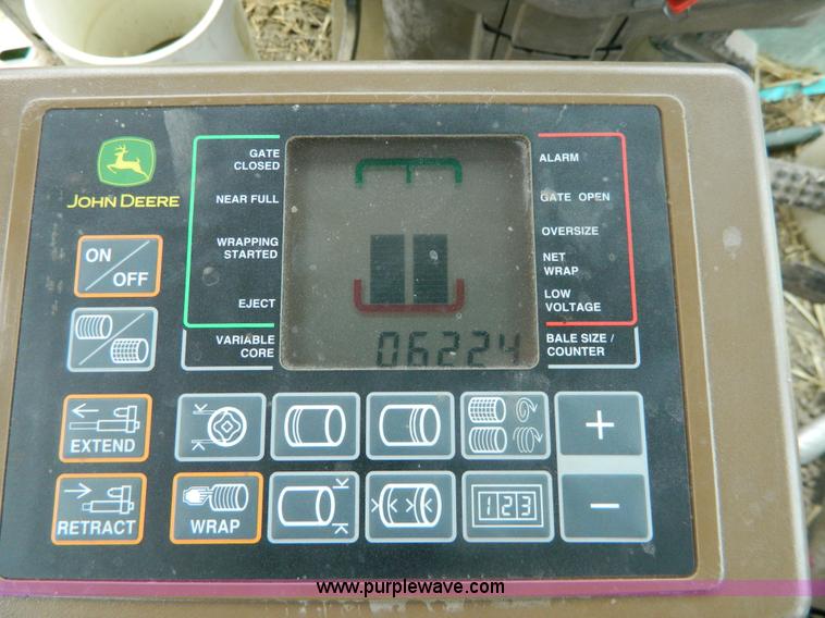 image for item H2449 2008 John Deere 568 mega wide round baler