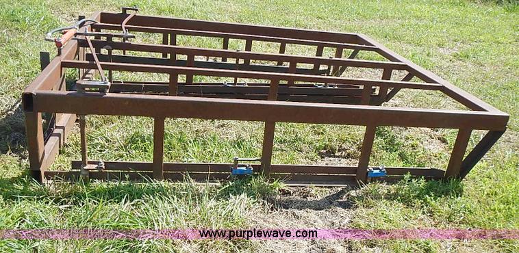 image for item J2101 Small square bale accumulator skid steer attachment