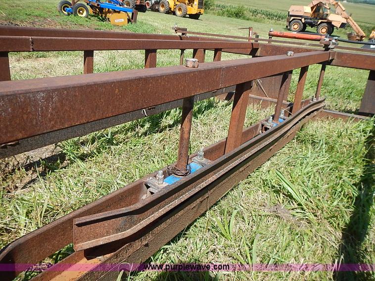 image for item J2101 Small square bale accumulator skid steer attachment