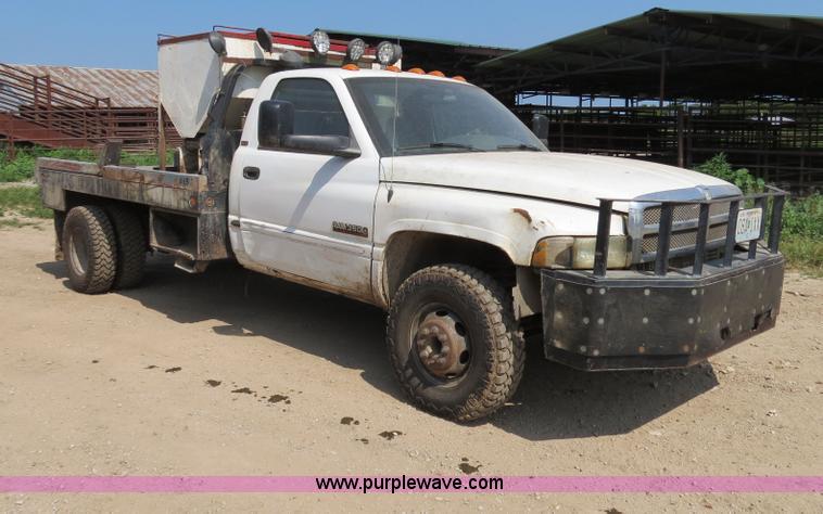 image for item AC9396 2002 Dodge Ram 3500 Laramie SLT flatbed truck
