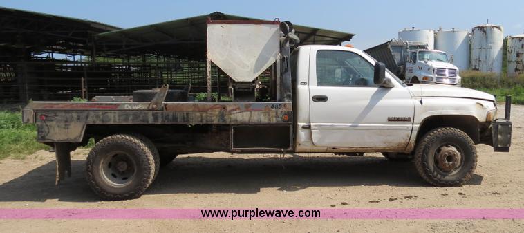 image for item AC9396 2002 Dodge Ram 3500 Laramie SLT flatbed truck