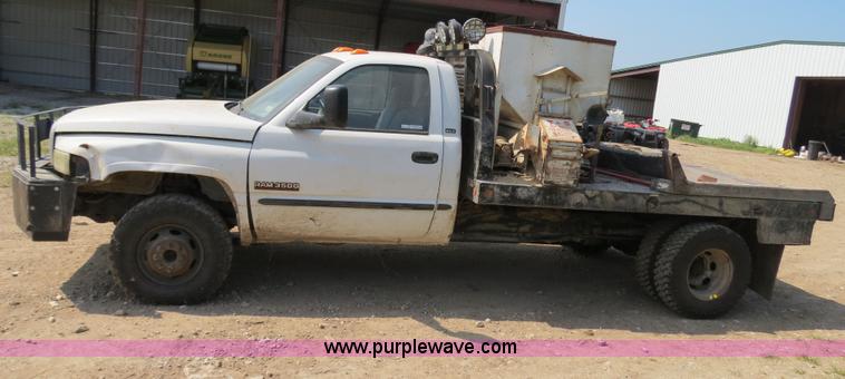 image for item AC9396 2002 Dodge Ram 3500 Laramie SLT flatbed truck