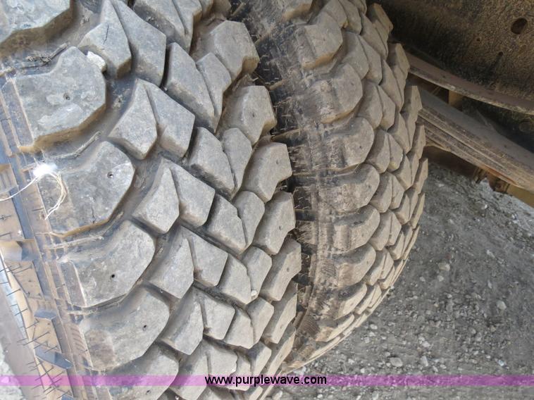 image for item AC9396 2002 Dodge Ram 3500 Laramie SLT flatbed truck