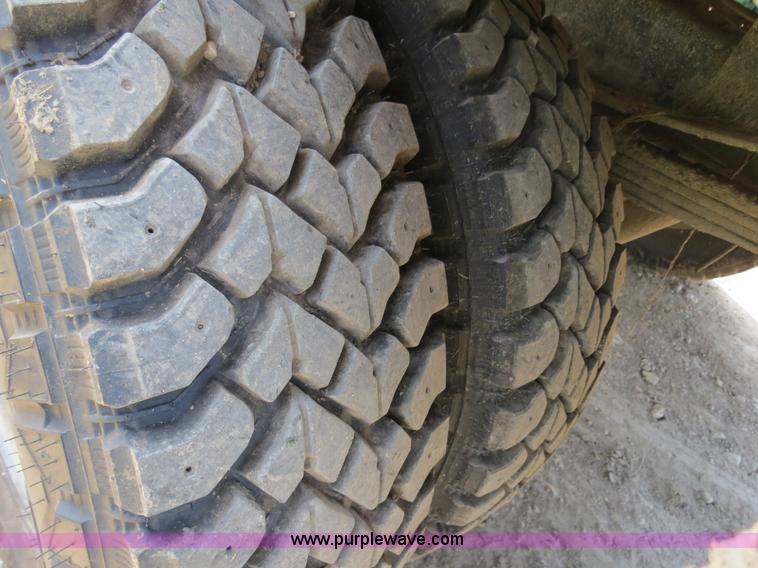 image for item AC9396 2002 Dodge Ram 3500 Laramie SLT flatbed truck