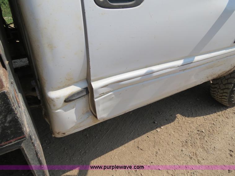 image for item AC9396 2002 Dodge Ram 3500 Laramie SLT flatbed truck