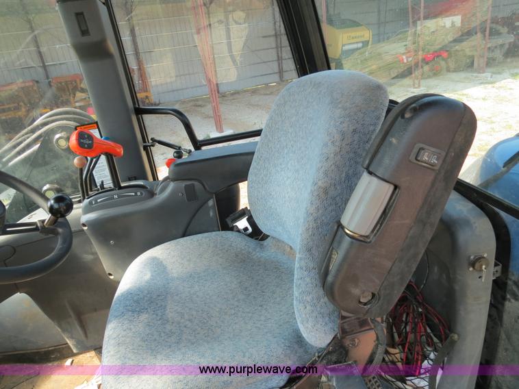 image for item F4968 2007 New Holland TV145 MFWD bi-directional tractor