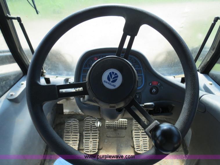 image for item F4968 2007 New Holland TV145 MFWD bi-directional tractor