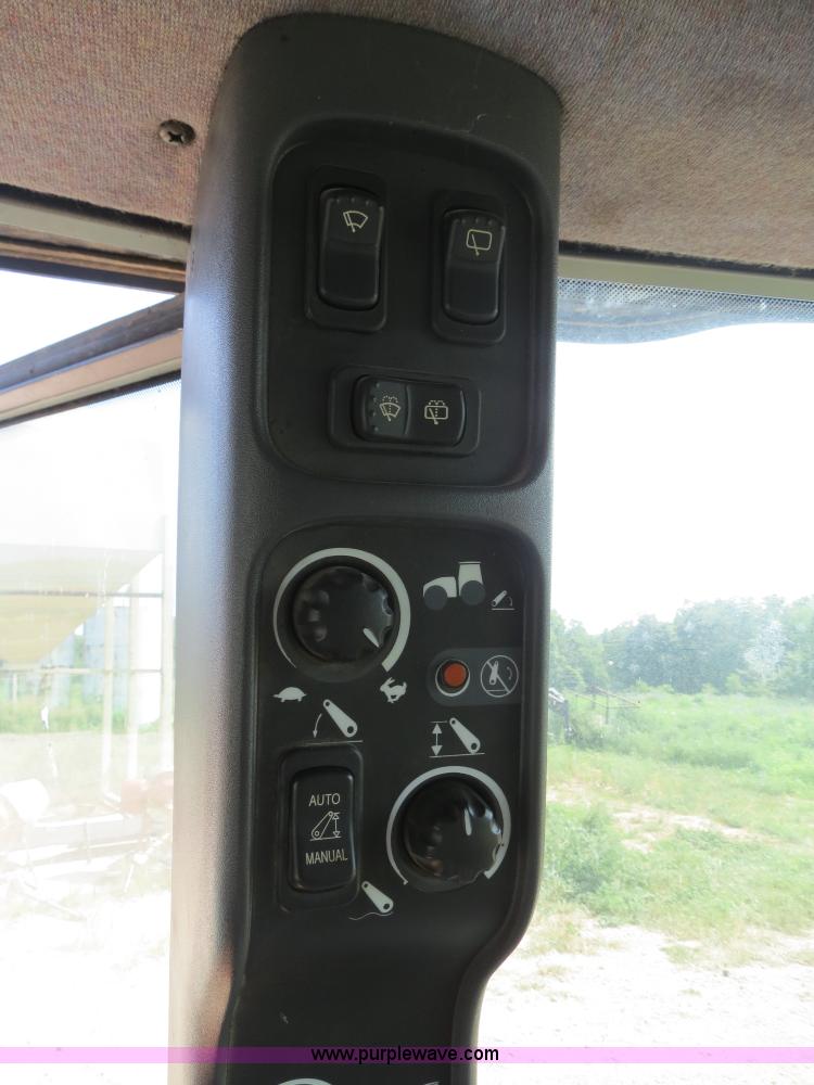 image for item F4968 2007 New Holland TV145 MFWD bi-directional tractor