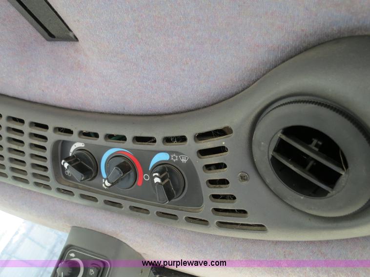 image for item F4968 2007 New Holland TV145 MFWD bi-directional tractor