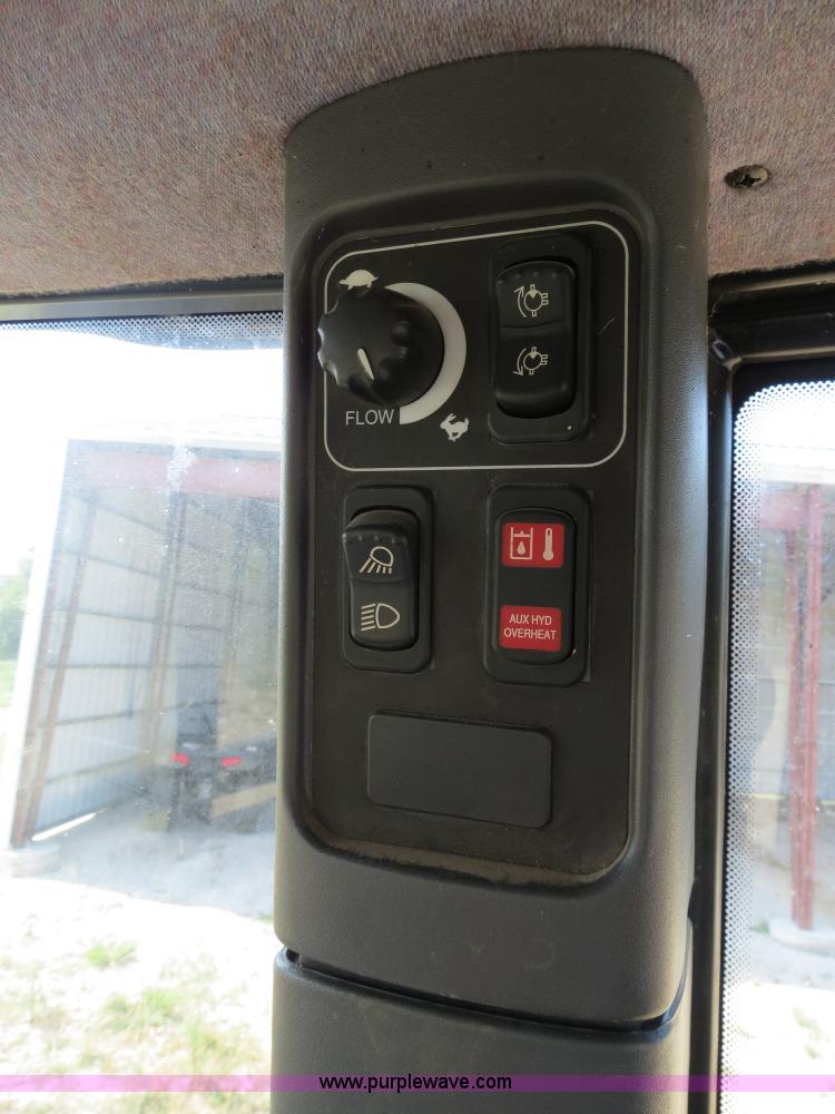 image for item F4968 2007 New Holland TV145 MFWD bi-directional tractor