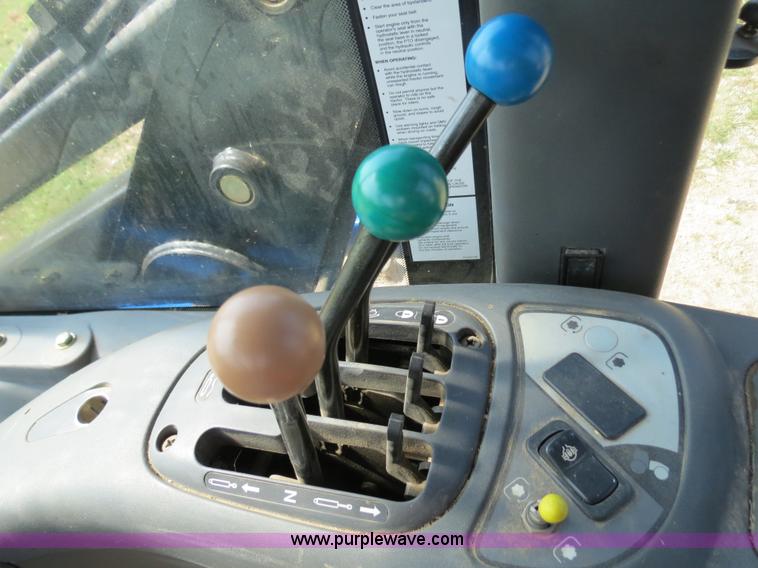 image for item F4968 2007 New Holland TV145 MFWD bi-directional tractor