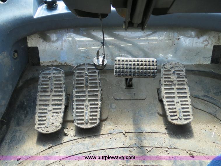 image for item F4968 2007 New Holland TV145 MFWD bi-directional tractor