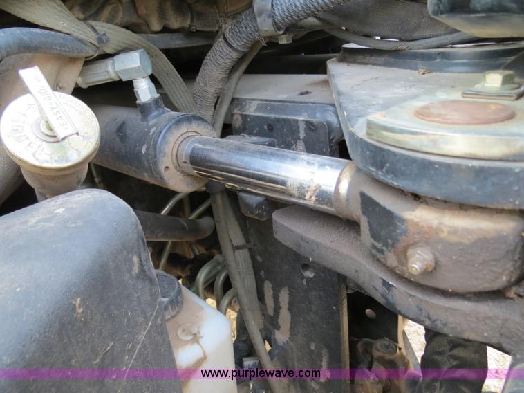 image for item F4968 2007 New Holland TV145 MFWD bi-directional tractor