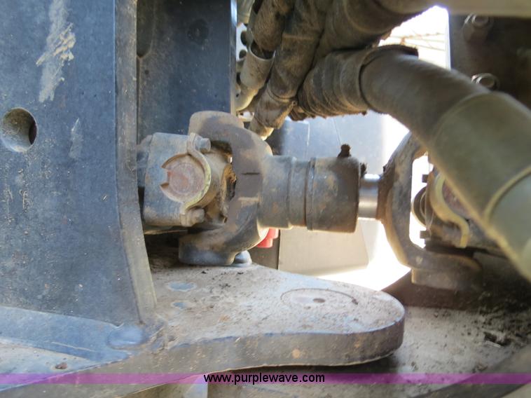 image for item F4968 2007 New Holland TV145 MFWD bi-directional tractor