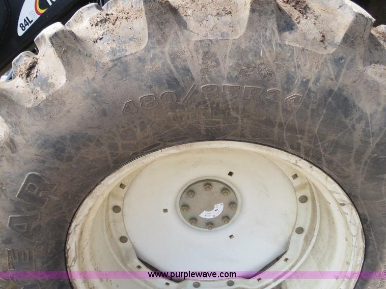 image for item F4968 2007 New Holland TV145 MFWD bi-directional tractor