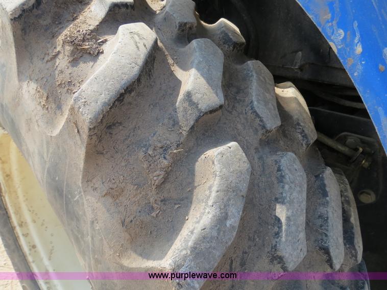 image for item F4968 2007 New Holland TV145 MFWD bi-directional tractor