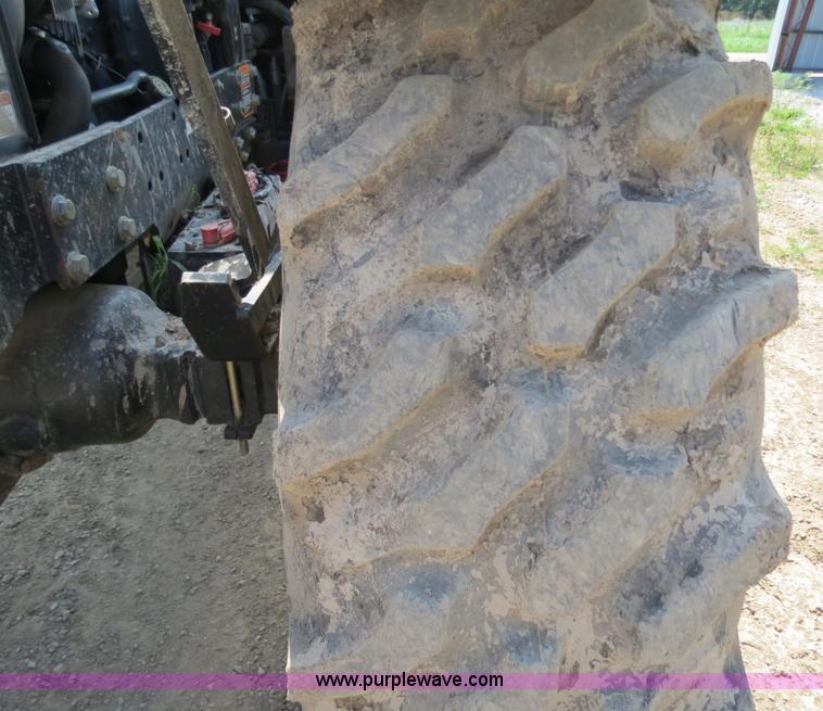 image for item F4968 2007 New Holland TV145 MFWD bi-directional tractor