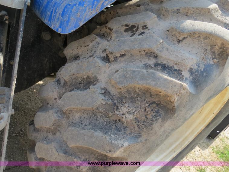 image for item F4968 2007 New Holland TV145 MFWD bi-directional tractor