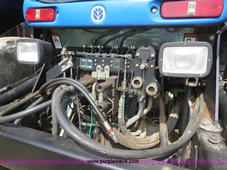image for item F4968 2007 New Holland TV145 MFWD bi-directional tractor