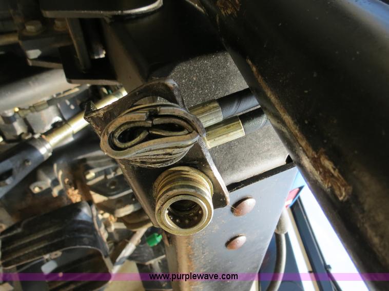 image for item F4968 2007 New Holland TV145 MFWD bi-directional tractor