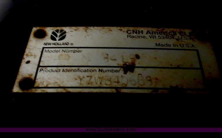 image for item F4968 2007 New Holland TV145 MFWD bi-directional tractor