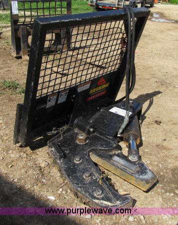 image for item F4973 Erskine tree shear skid steer attachment
