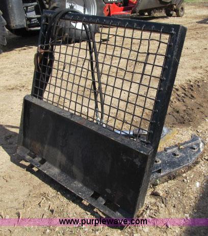 image for item F4973 Erskine tree shear skid steer attachment