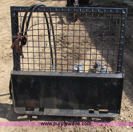 image for item F4973 Erskine tree shear skid steer attachment