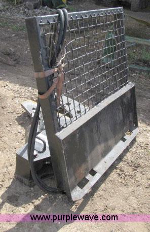 image for item F4973 Erskine tree shear skid steer attachment