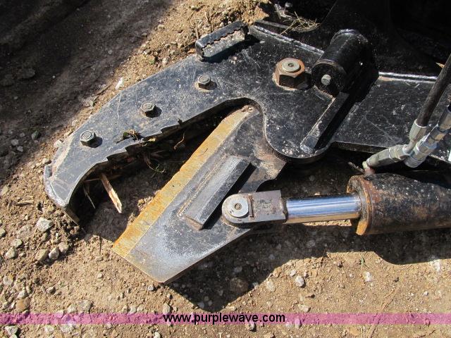 image for item F4973 Erskine tree shear skid steer attachment