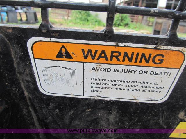 image for item F4973 Erskine tree shear skid steer attachment