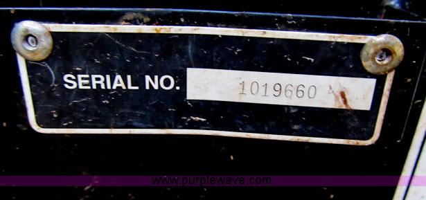 image for item F4973 Erskine tree shear skid steer attachment