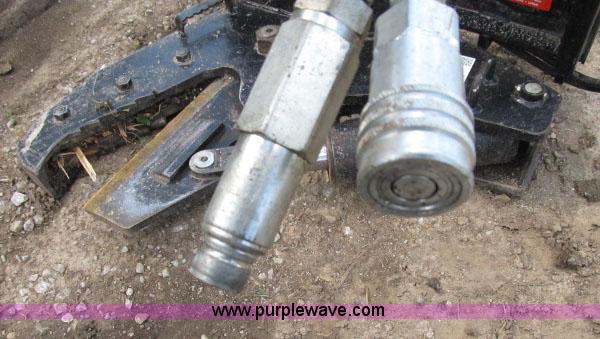 image for item F4973 Erskine tree shear skid steer attachment